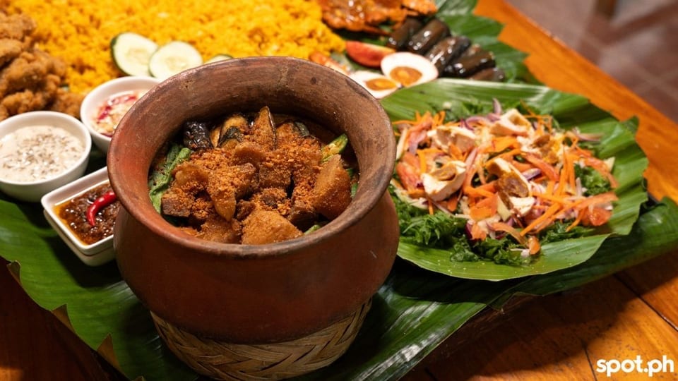 This pot of Kare-Kare is an a la carte order added to the Seafood Boodle
